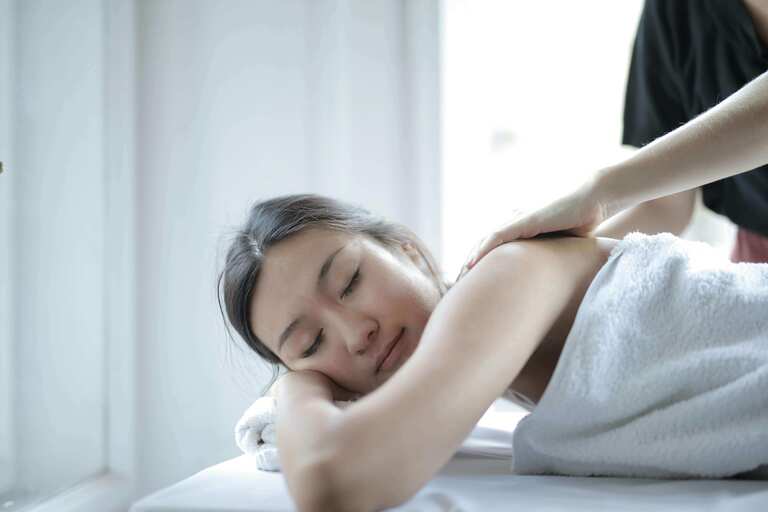smiling woman getting massage